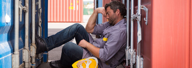 adult worker portrait taking a nap in the shade