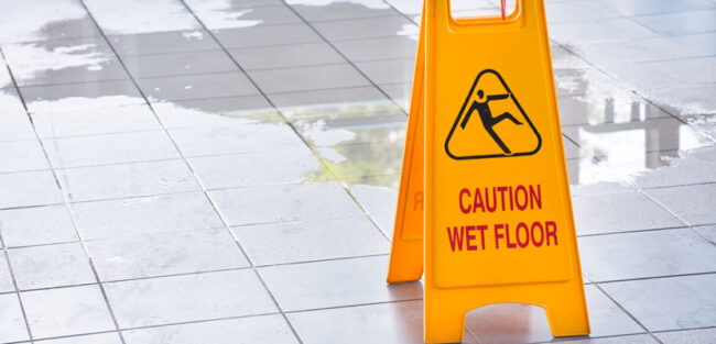 Wet floor with caution sign