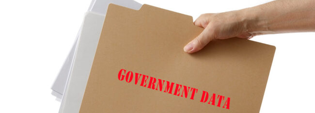 Minnesota Government Data Practices Act: The Basics Hand holds a tan file folder with papers peaking out, "government data" is stamped on folder in red