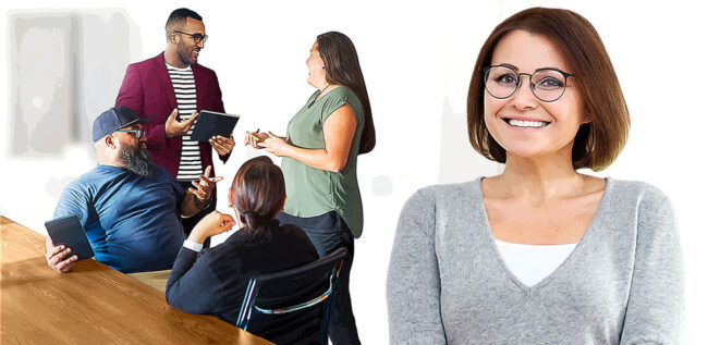 Woman smiles at camera while co-workers talk in the distance