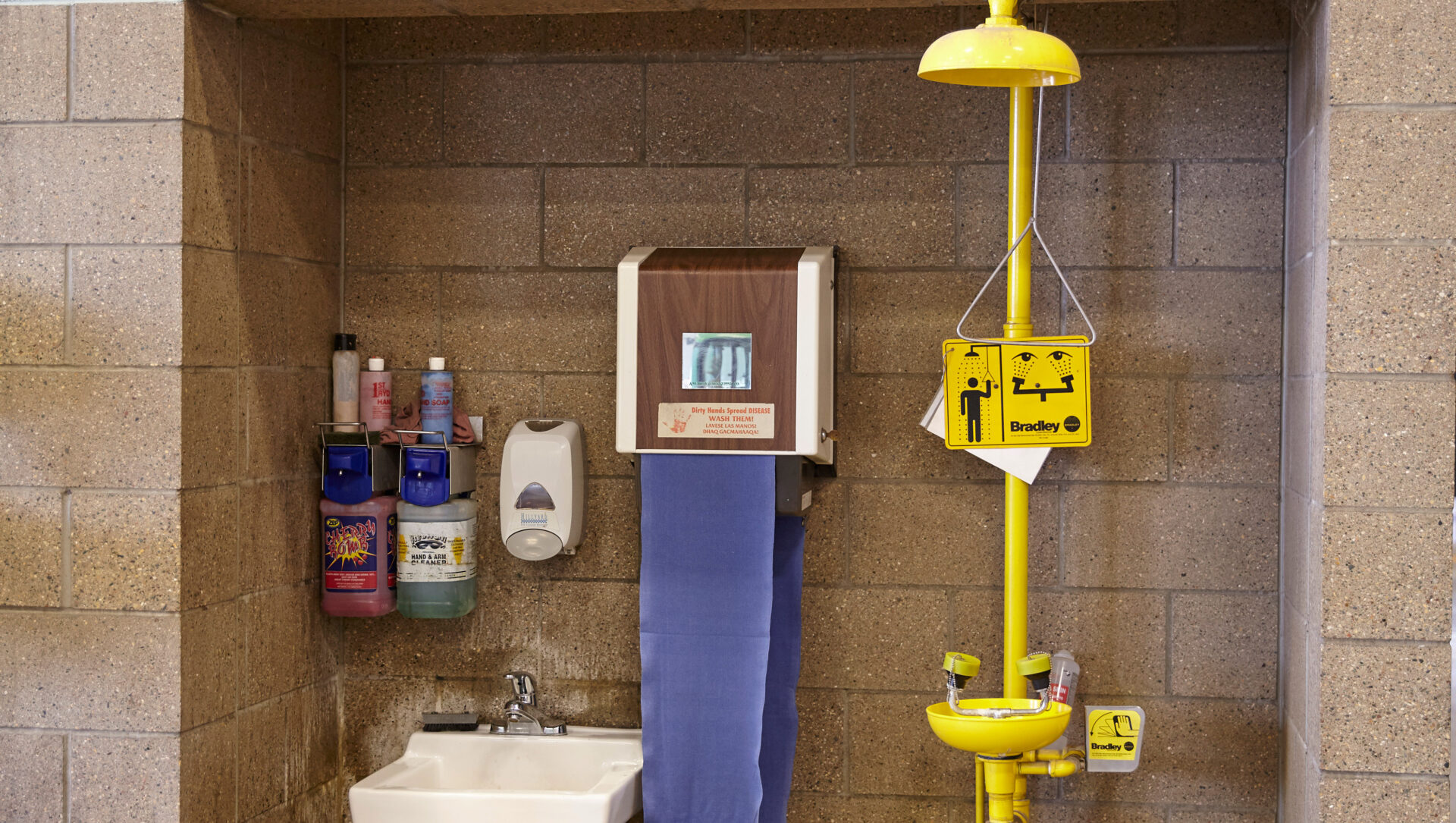 Emergency eye wash station next to sink