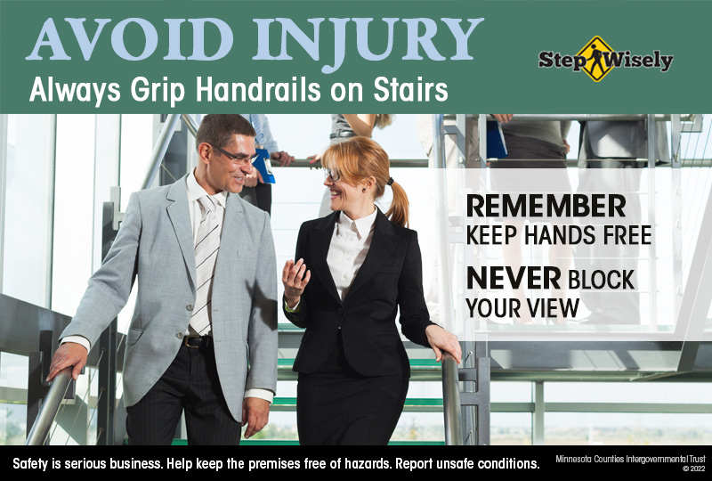 Image: Avoid Injury, Always Grip Handrails on Stairs. Man and woman walking down stairs in office building while holding onto hand rail.