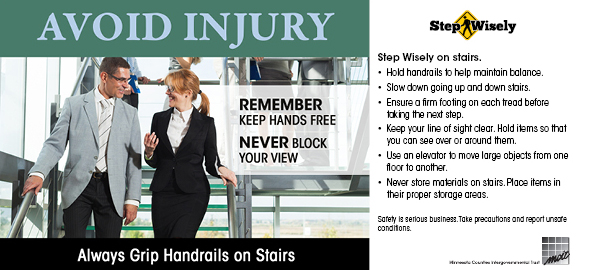 Table Tent Panel: Avoid Injury, Always Grip Handrails on Stairs. Man and woman walking down stairs in office building while holding onto hand rail.