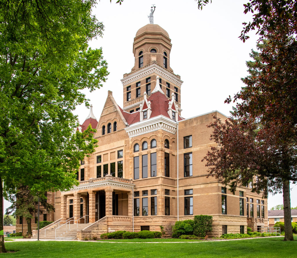 Le Sueur County courthouse framed by trees