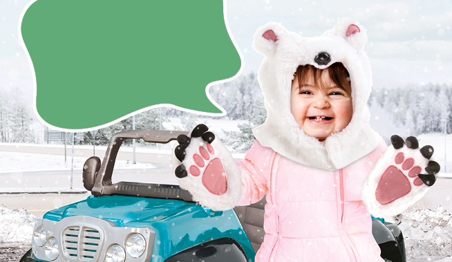 Toddler dressed in bear snow suit in front of toy jeep with empty word bubble