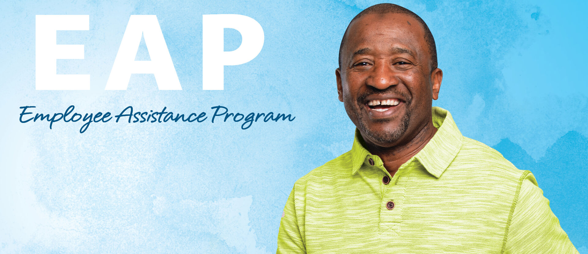 Against a bright blue graded background a mature African American smiles. Text: EAP, Employee Assistance Program