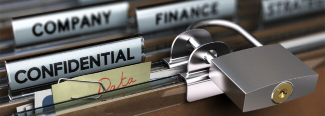 Close up of file folders with metal lock. Tabs read "Company", "Finance" and "Confidential".
