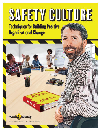 Cover of Safety Culture Handbook: Techniques for Building Positive Organizational Change. Man sitting at table for a meeting, turned toward camera and smiling. Has a Safety Data Sheet book in front of him.