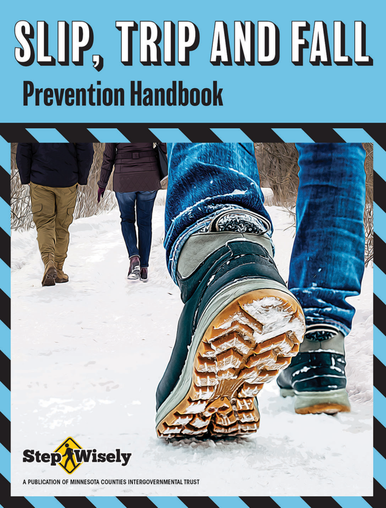 Cover page for Slip, Trip and Fall Prevention Handbook shows close up of person's foot as he/she walks on snow-covered path while wearing deep tread boots. Others walk in the background.