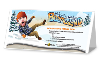 Step Wisely Walking in a Winter Blunderland table tent. "Avoid shortcuts through snow" Man with large cartoonish head slipping on a snowbank next to a path.