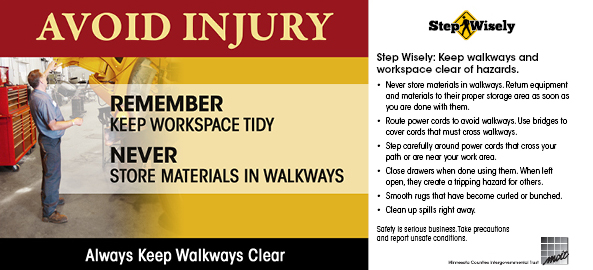 Table tent panel: Avoid Injury, Always Keep Walkways Clear: Shows public works shop and man working on large truck with the walkway clear of clutter from him to back of shop.