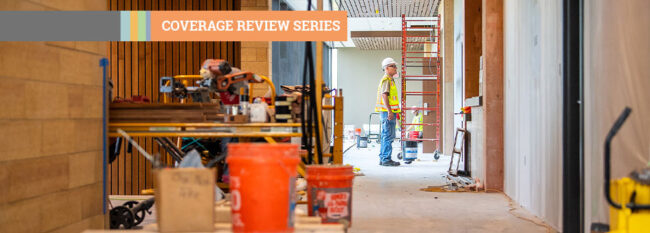 Coverage Review Series - man overseeing building construction