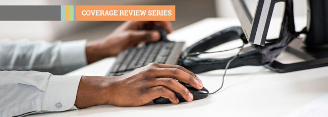 Coverage Review Series - man using computer - hands view only