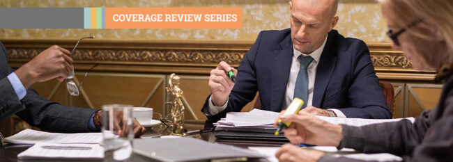 Coverage Review Series - Lawyers reviewing and highlighting documents