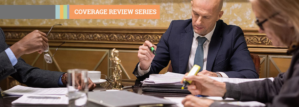 Coverage Review Series - Lawyers reviewing and highlighting documents