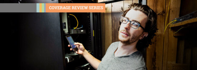 Coverage Review Series - suspicious man with cellphone by server