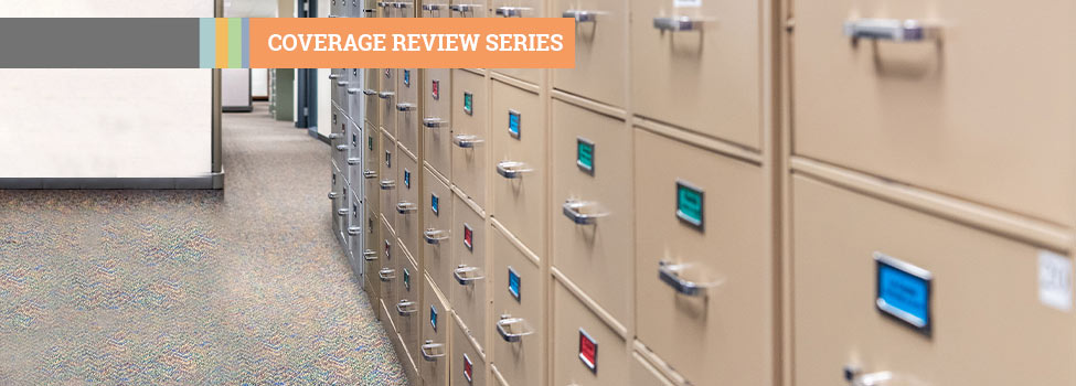 Coverage Review Series - File cabinets in a row in an office hallway