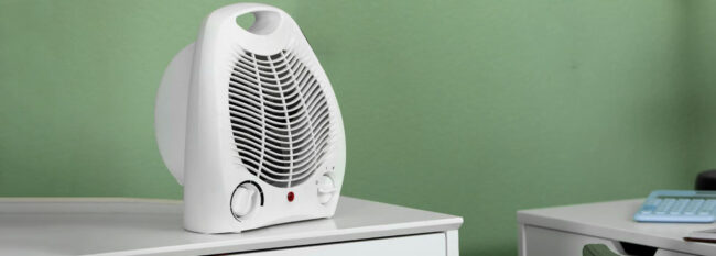 Space Heater on office desk drawers
