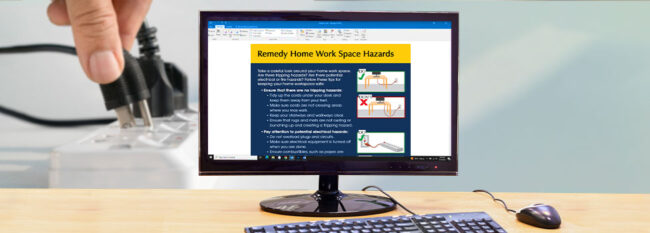 Remedy Home Work Space Hazards email open on desktop computer. Man plugging in plug into surge protector.