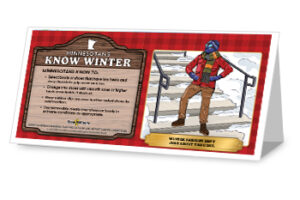Step Wisely Minnesotan's Know Winter table tent. Illustration of man in winter gear standing confidently on a snowy path.