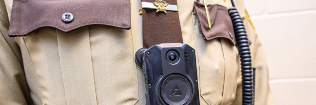 Close up of body-worn camera on chest of deputy sheriff