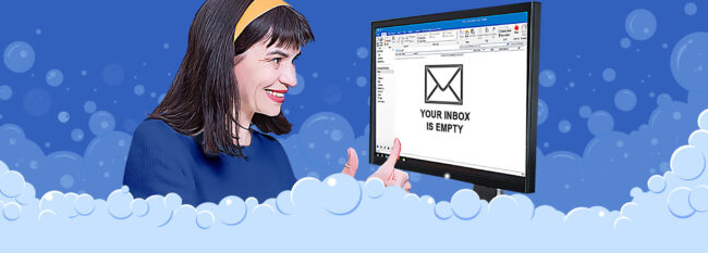 Against blue bubble background, business woman with thumbs up looks at computer monitor showing an empty email inbox