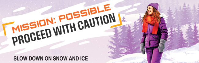 Mission: Possible: Proceed with Caution Woman walks on path cleared of snow, takes small steps and keeps head up to look for slip and fall hazards