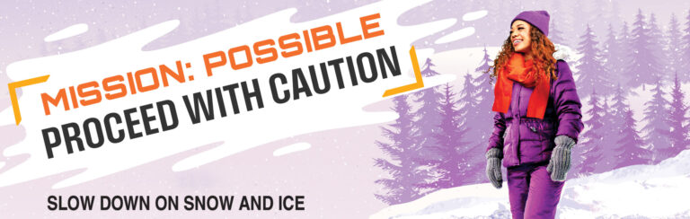 Woman walks on path cleared of snow, takes small steps and keeps head up to look for slip and fall hazards