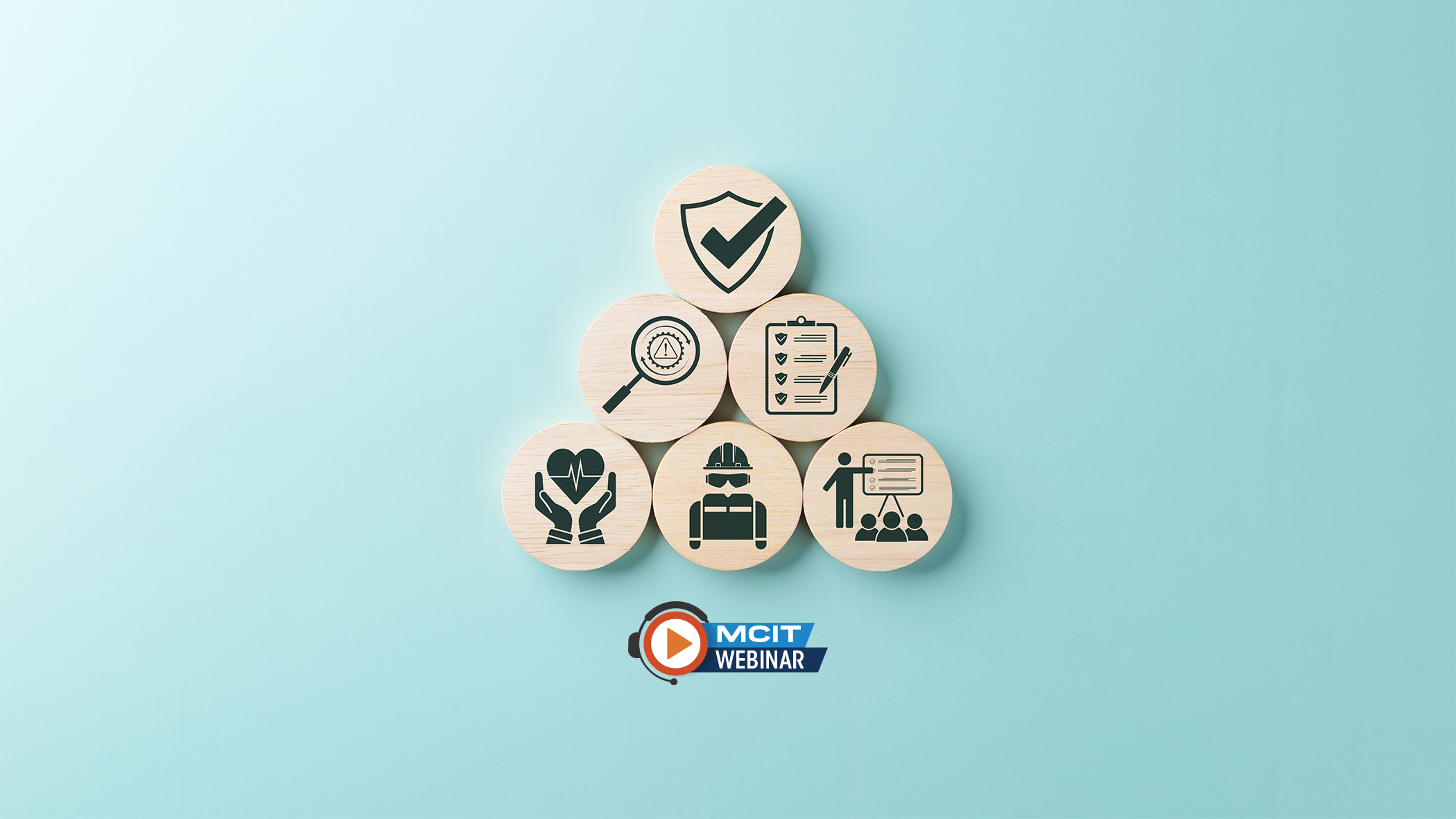 Circular wooden tiles show various aspects of a strong workplace safety program